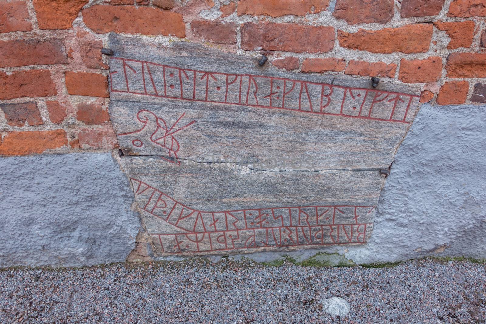 Runestone used to build a church foundation