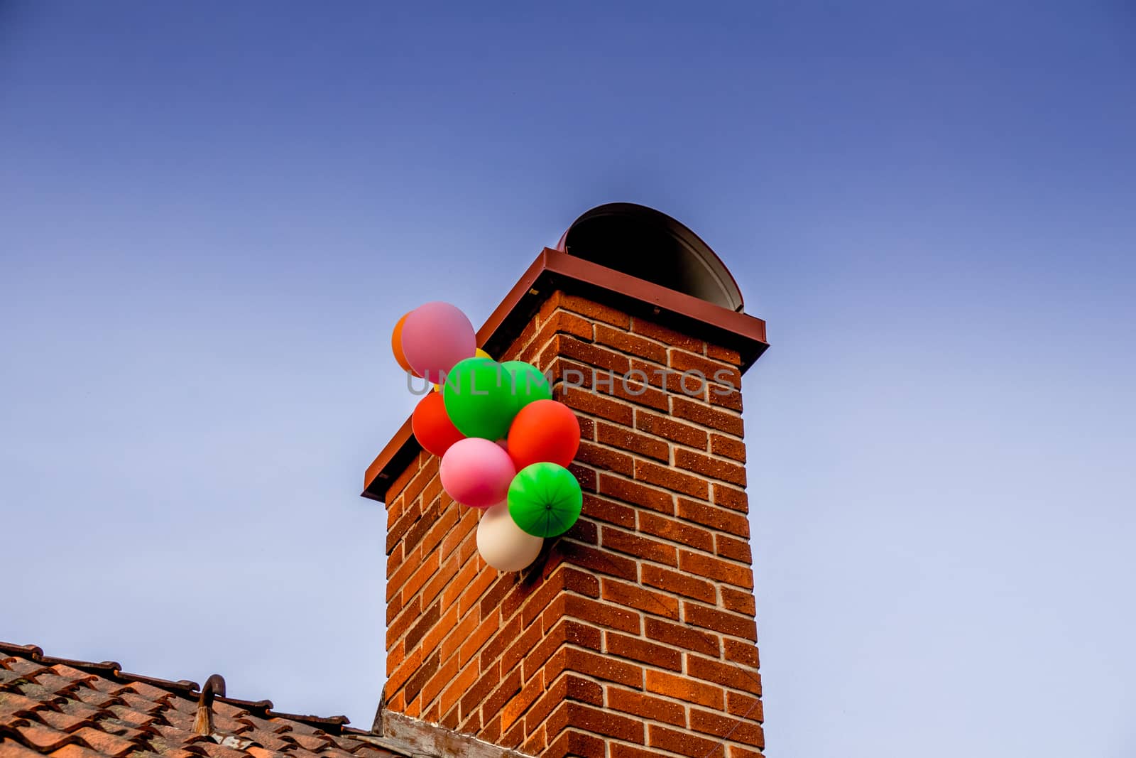 Ballons that got stuck on a chimney