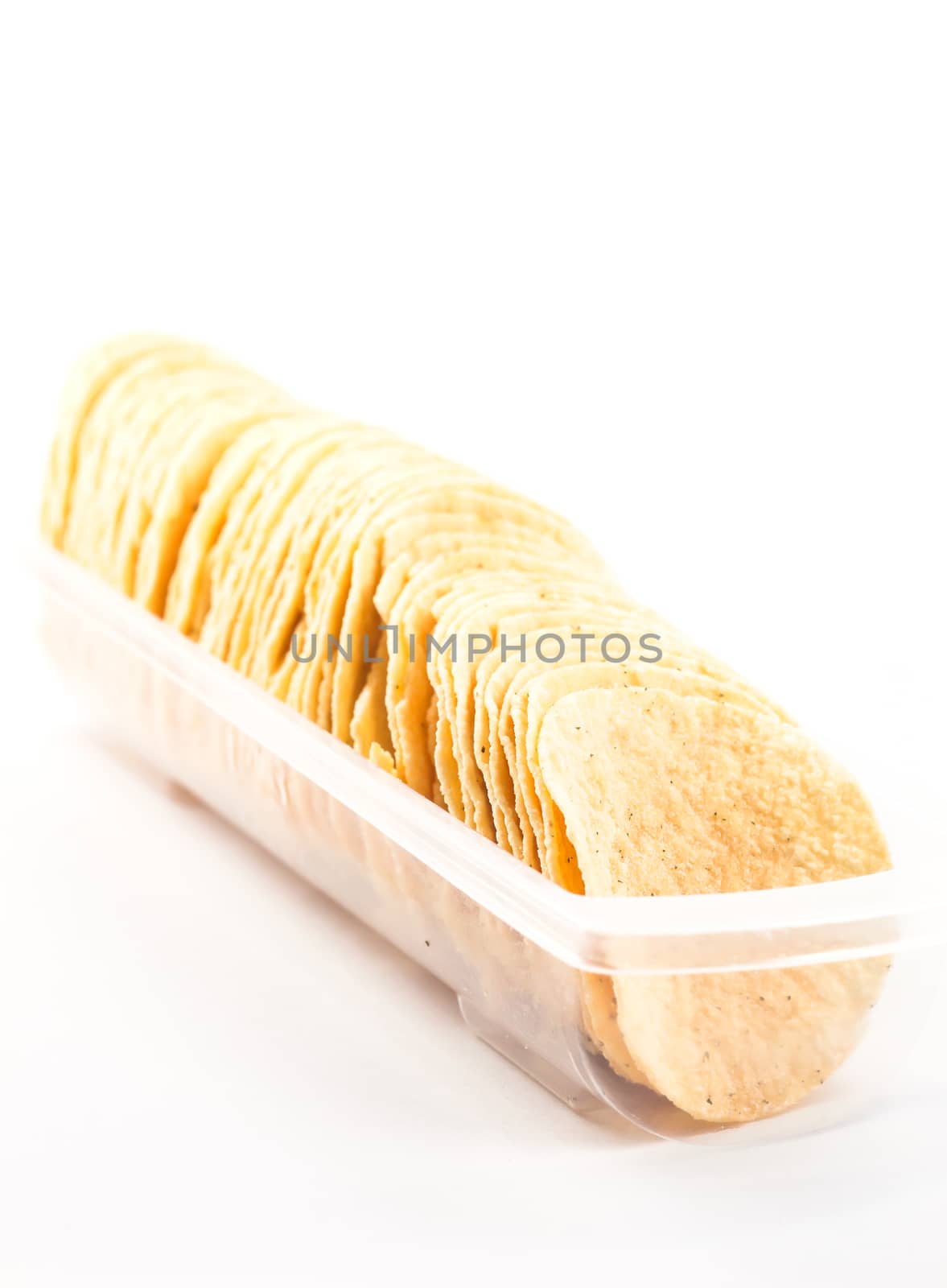 Potato chips on white background by punsayaporn