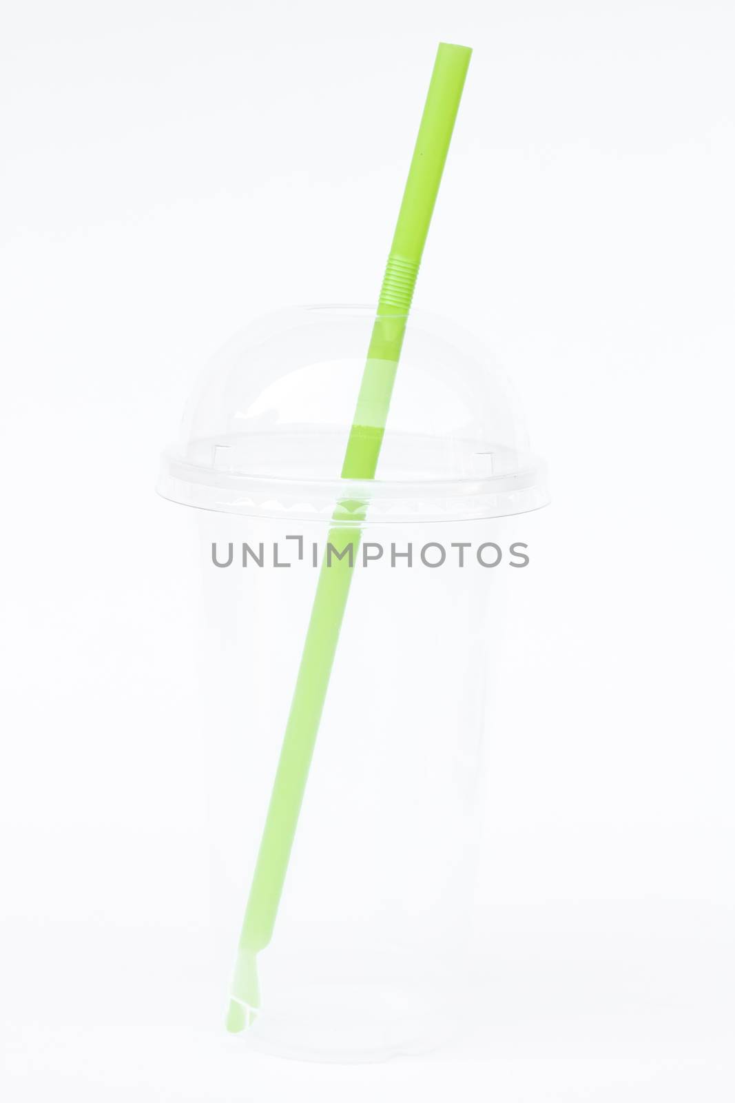 Empty plastic cup with straw isolated on white background by punsayaporn