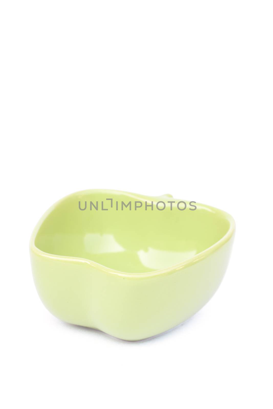 Green ceramic bowl isolated on white background, stock photo