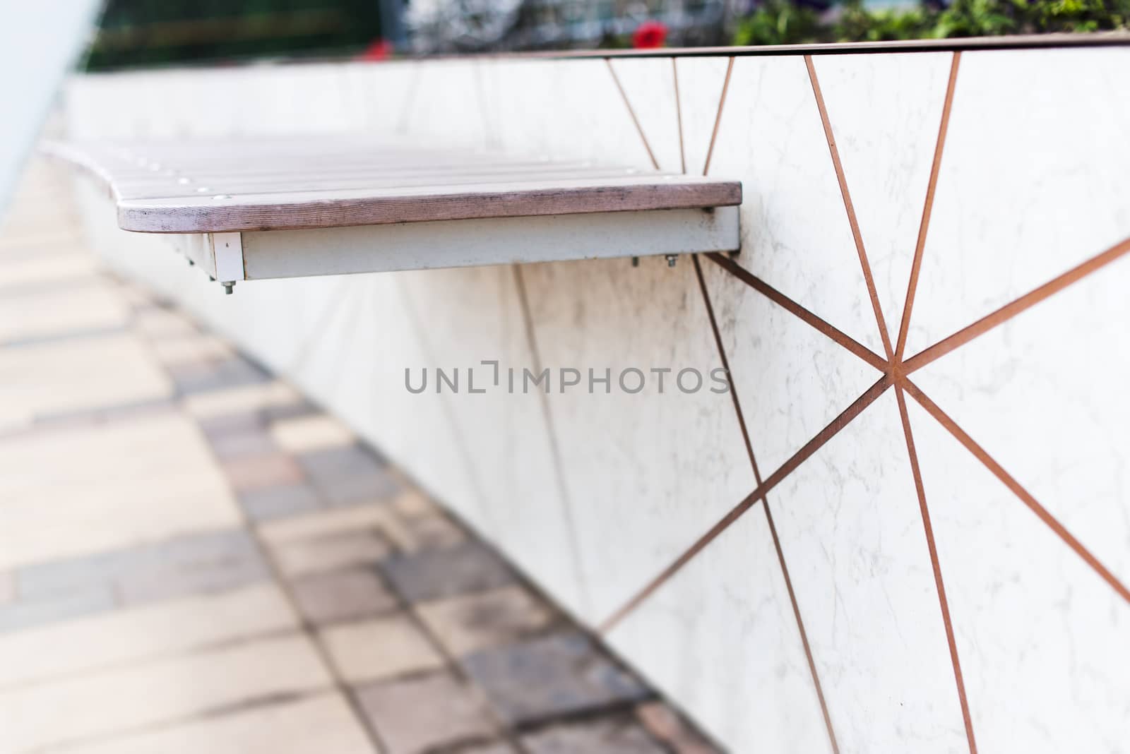 Bench mount to the wall, selective focus