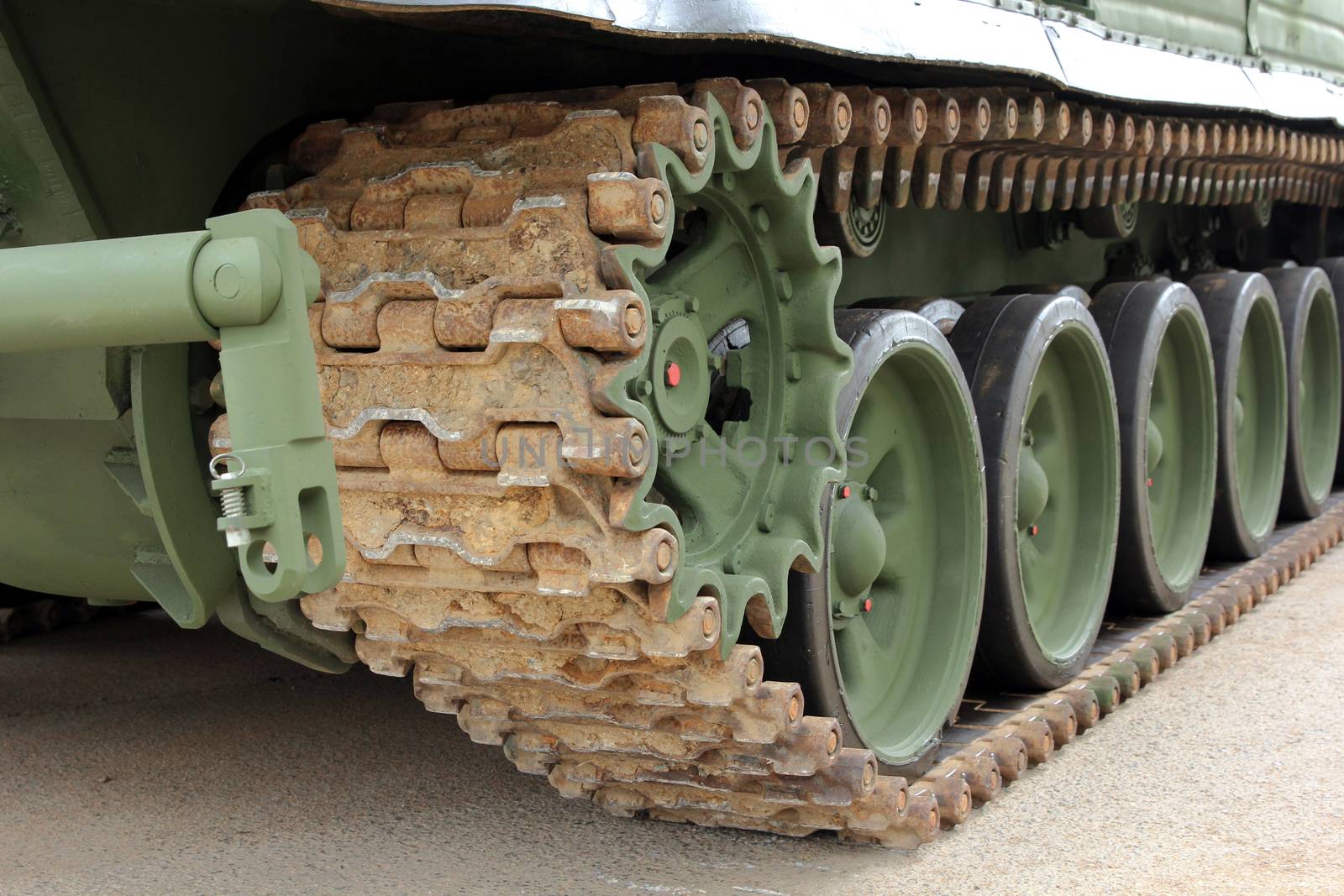 Part of the undercarriage of tracked military equipment, close-up