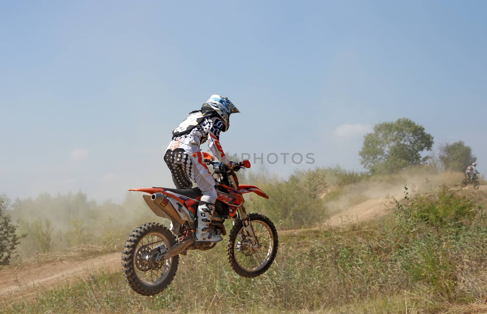 ARSENYEV, RUSSIA - AUG 30: Rider participates in the round of the 2014 Russia motocross championship on August 30, 2014 in Arsenyev, Russia.