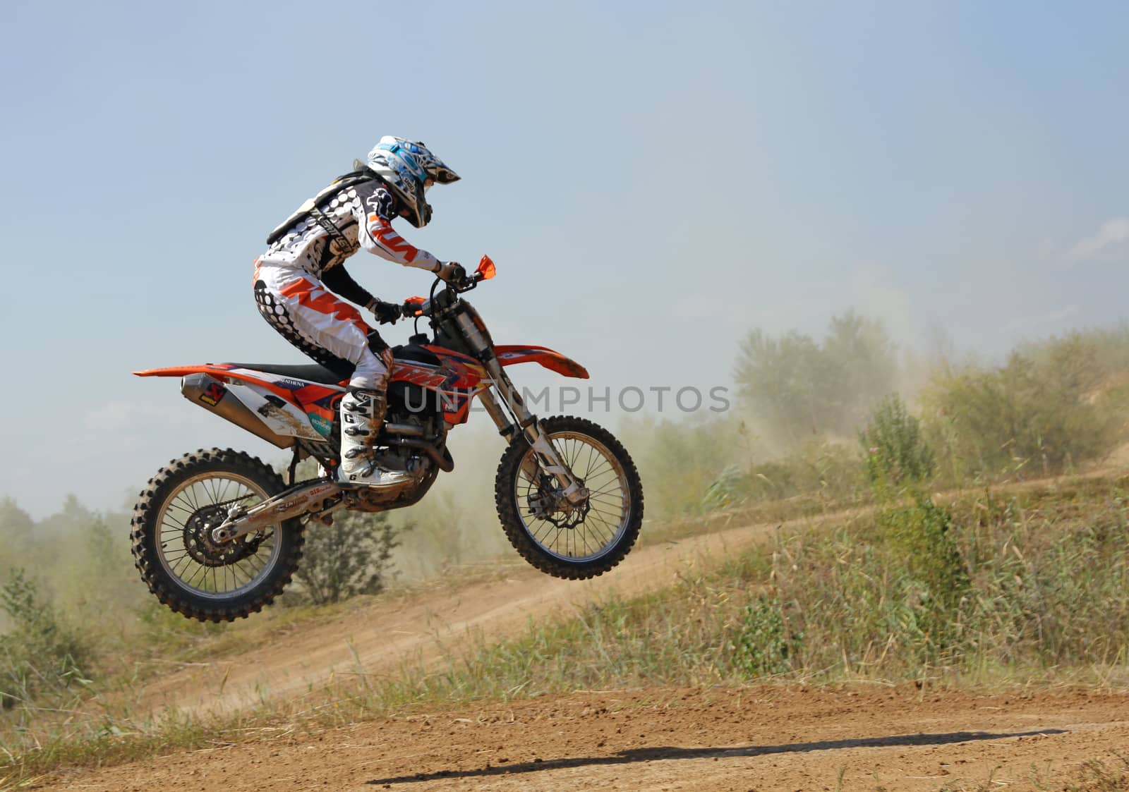 ARSENYEV, RUSSIA - AUG 30: Rider participates in the round of the 2014 Russia motocross championship on August 30, 2014 in Arsenyev, Russia.