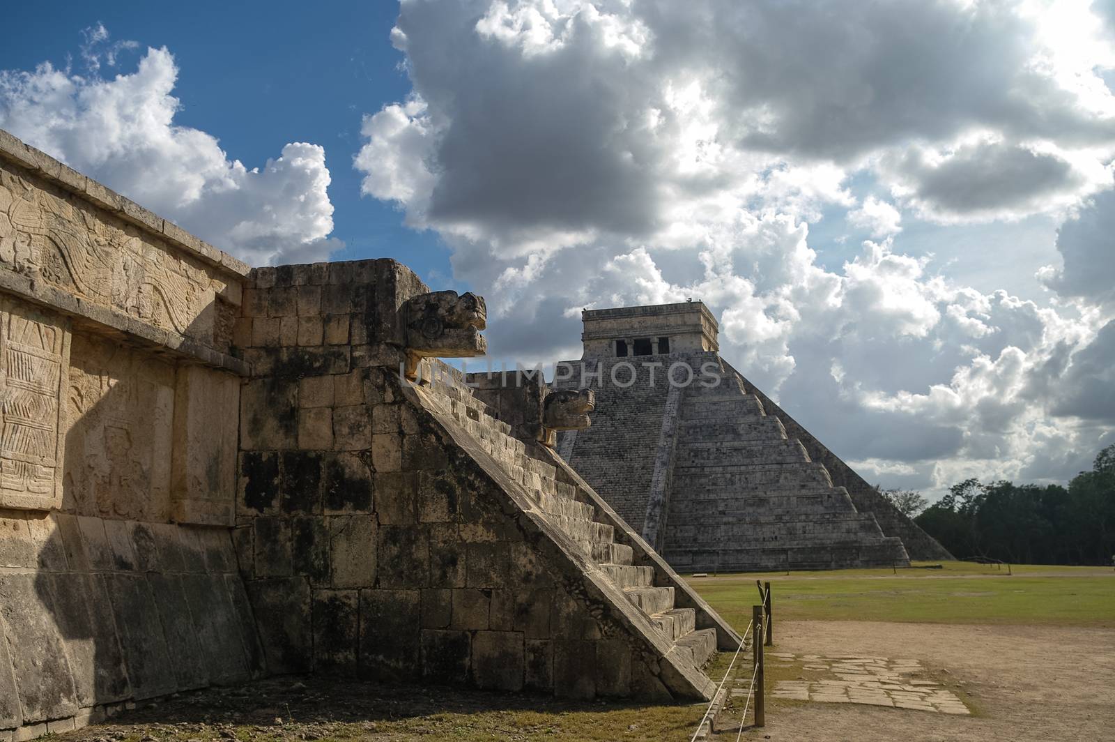 Mayan Pyramid of Kukulkan "El Castillo" as seen from the Platform of the Eagles and the Jaguars, Chichen Itza, Mexico.