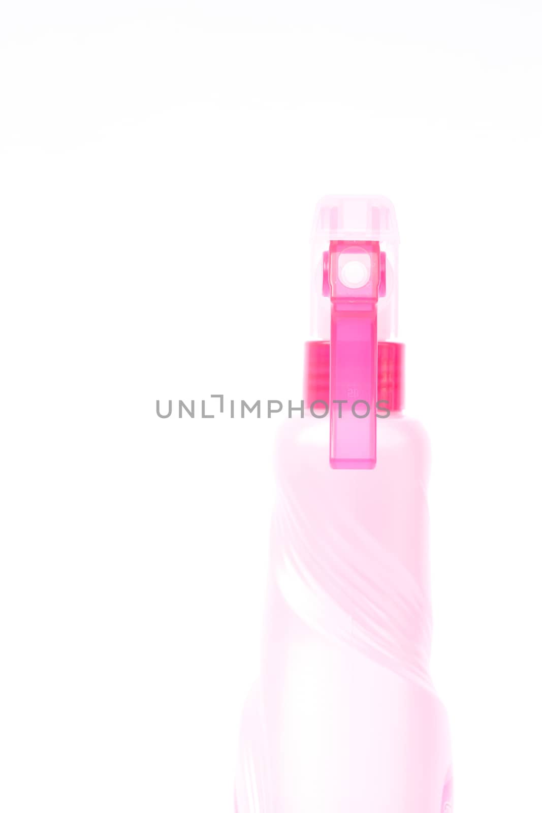 Pink plastic foggy spray bottle isolated on white background, stock photo