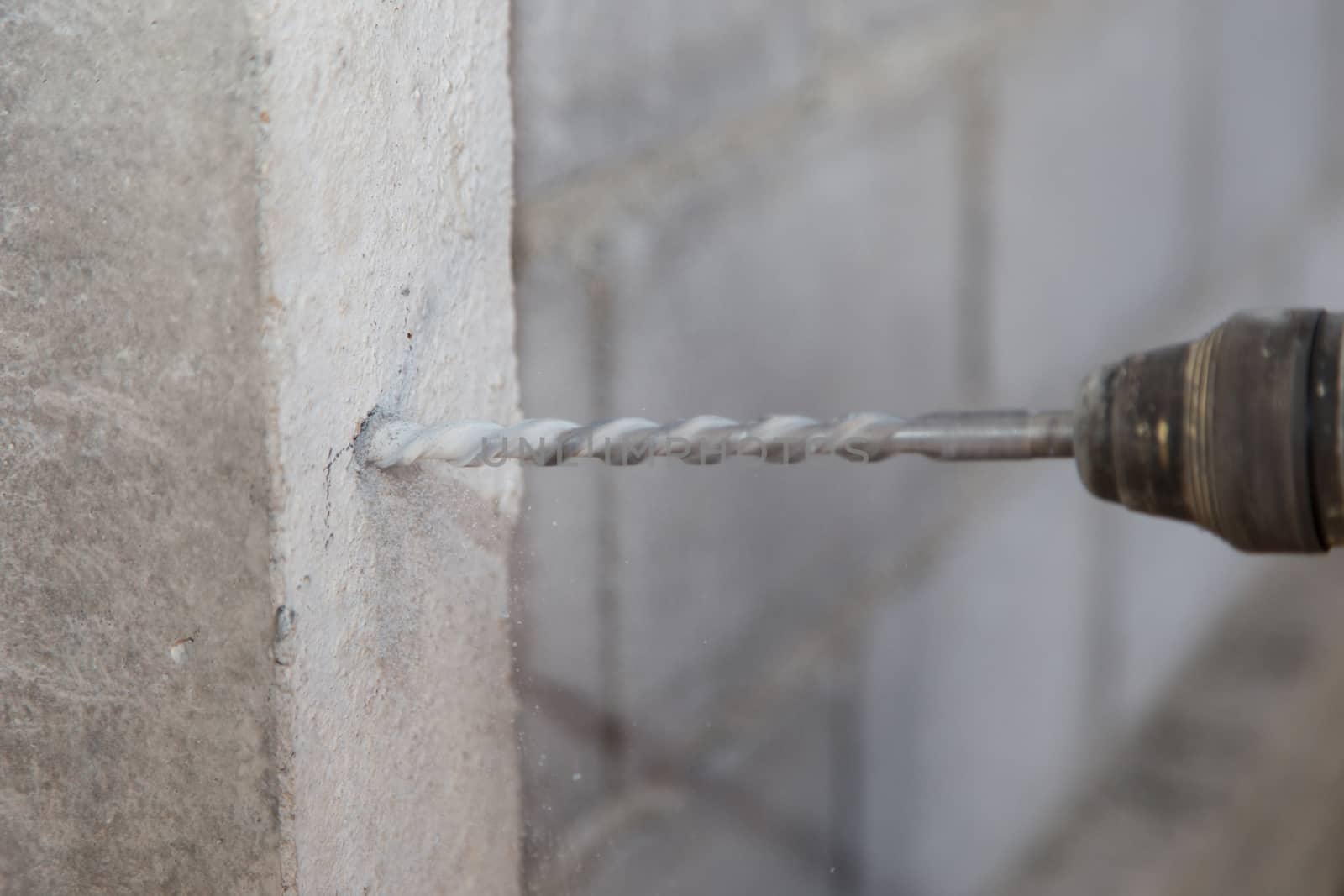 Electric Drill on concrete pillar