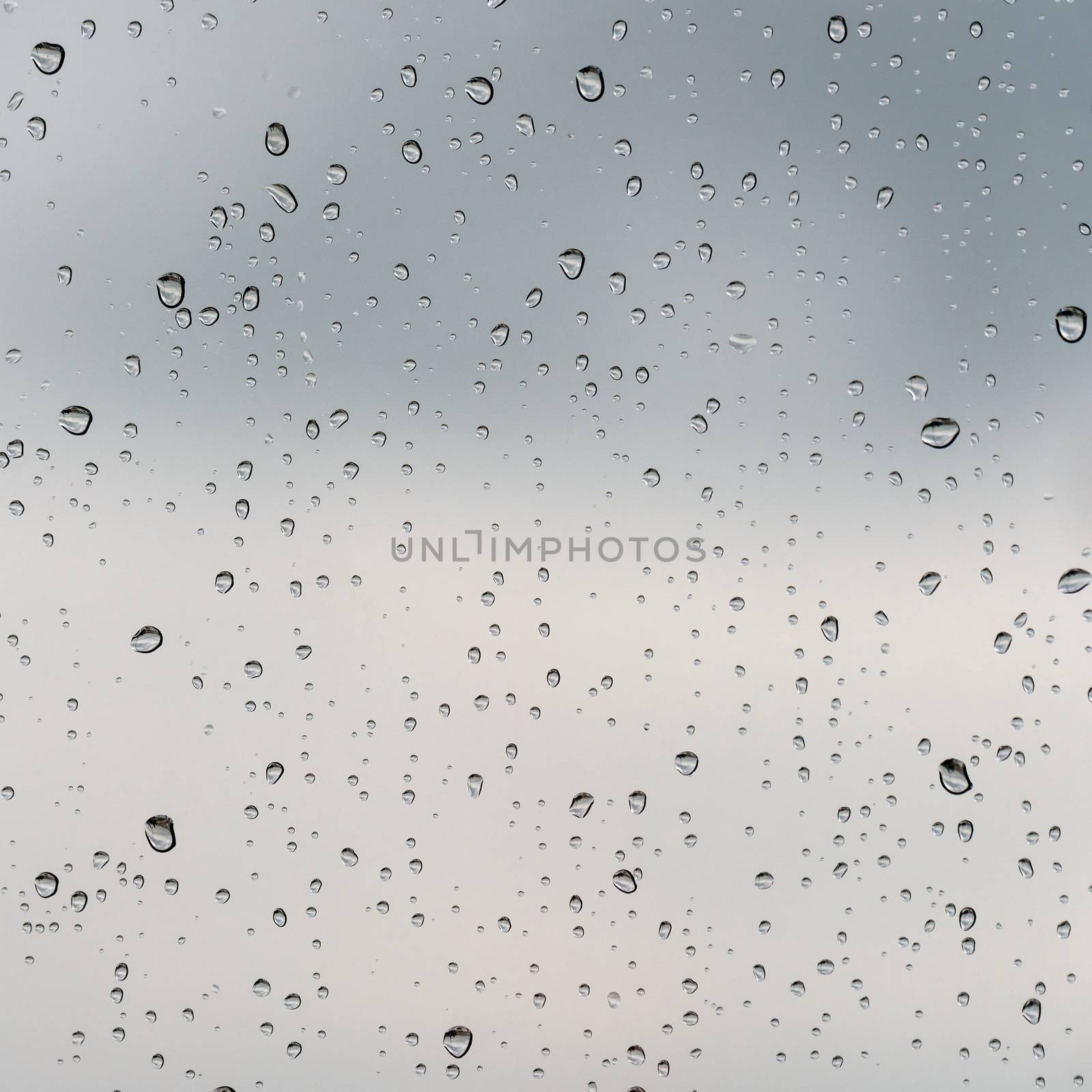Raindrops on a glass by dutourdumonde