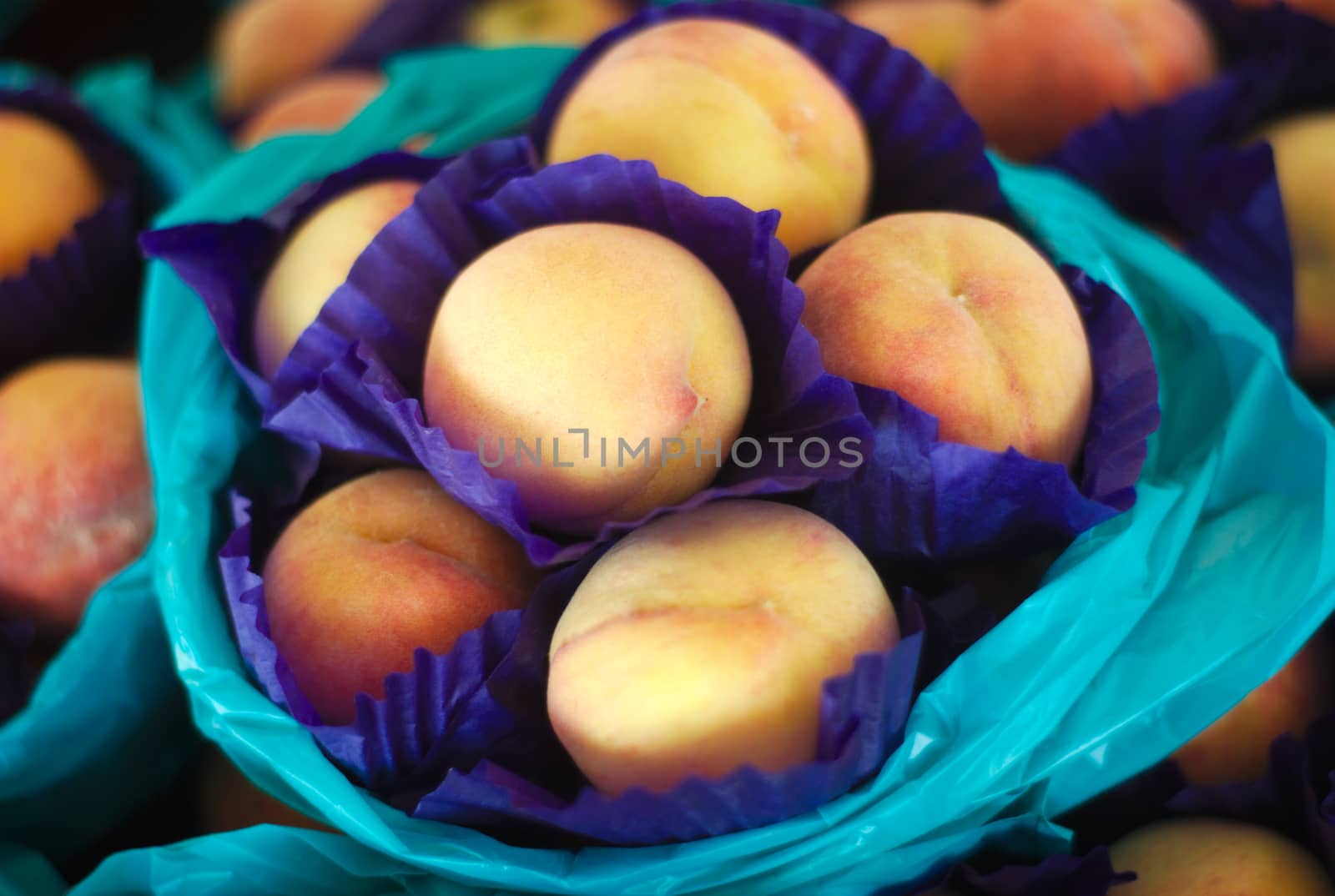 peaches for sale in basket at the market