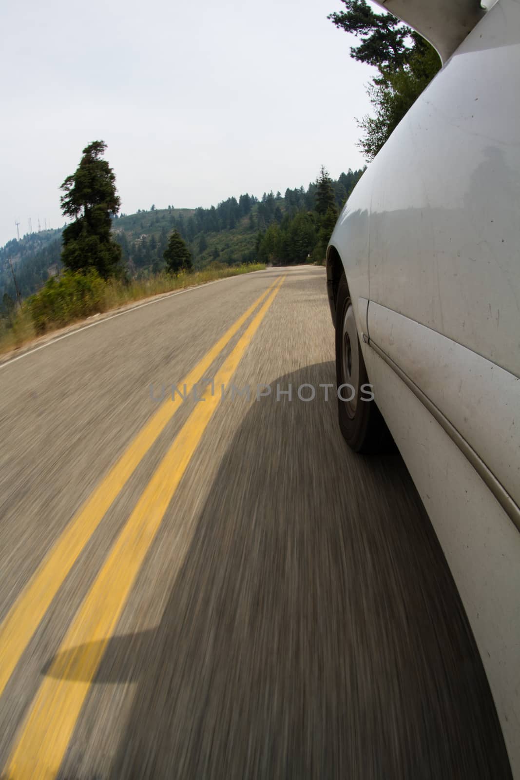 Dirty car driving out in the middle of nowhere