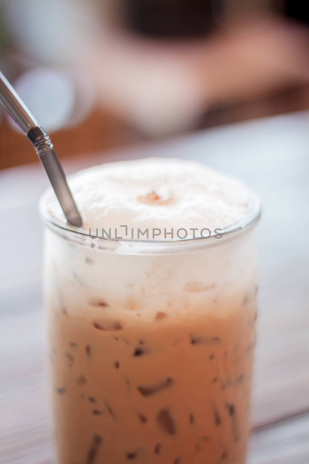 Iced Mocha Coffee in glass on the table by punsayaporn