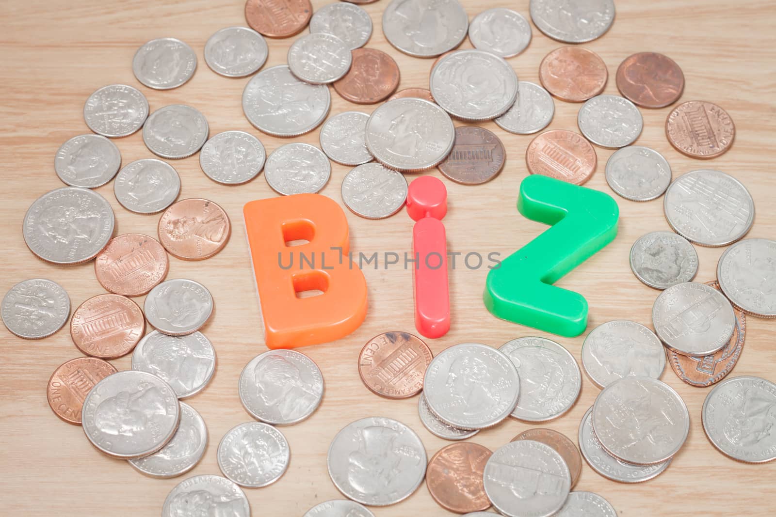 Biz alphabet with various US coins, stock photo