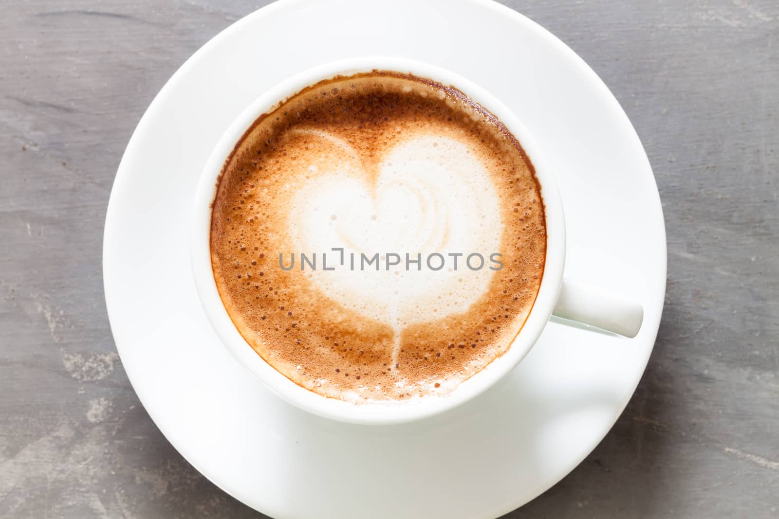 Coffee cup on grey background, stock photo