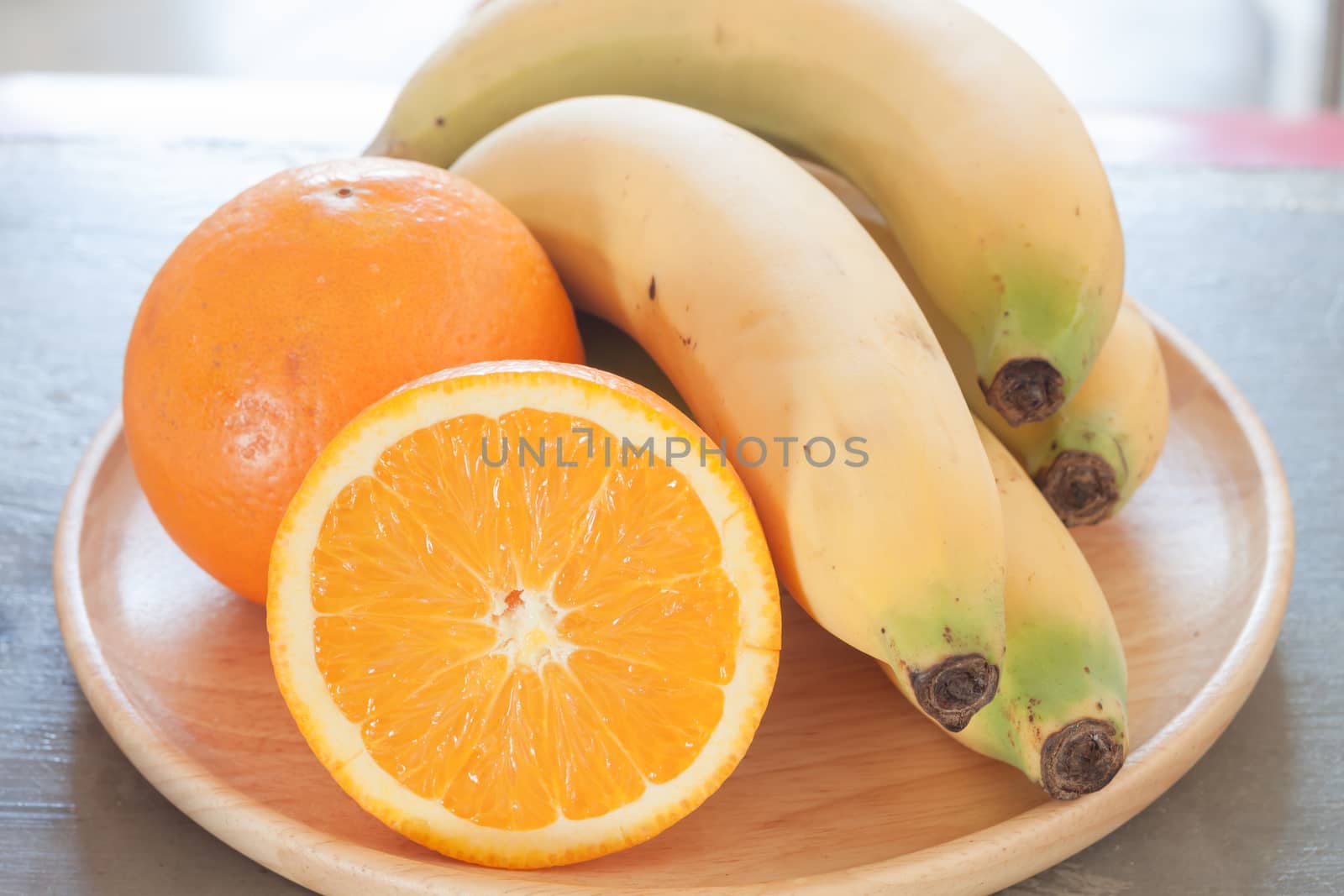 Healthy fruits with oranges and bananas, stock photo