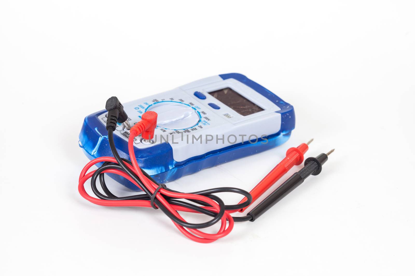 broken Digital multimeter on white background