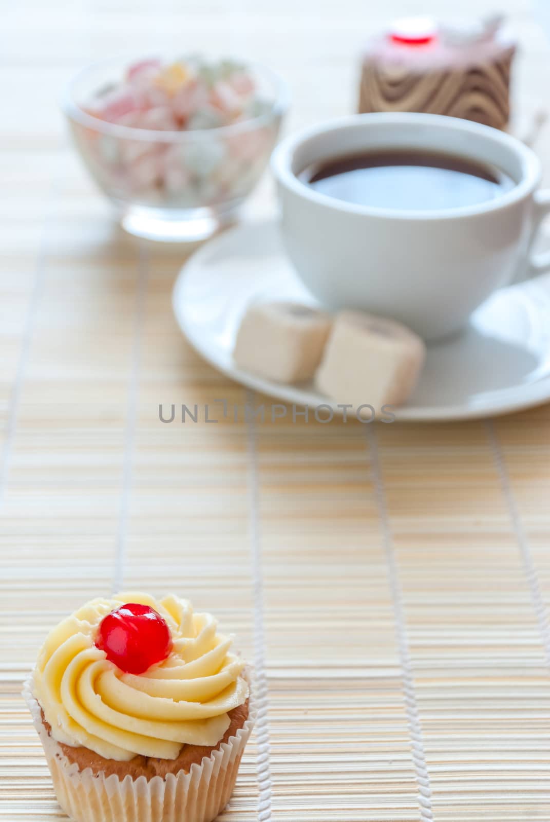 Tea, fresh cherry muffin, colorful delight and various cake, sweet dessert, with place for your text, soft focus