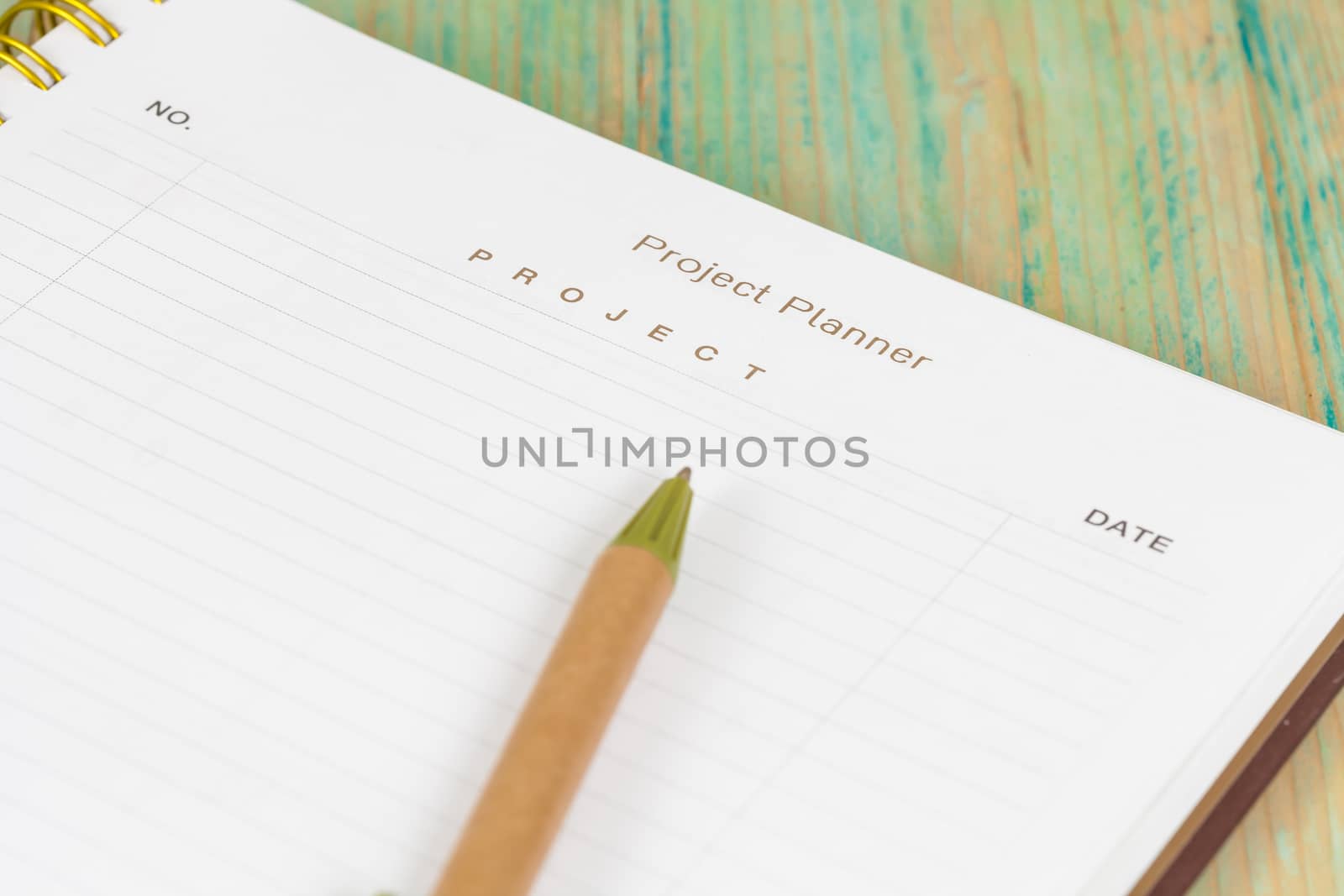 Closeup to agenda on project planner book