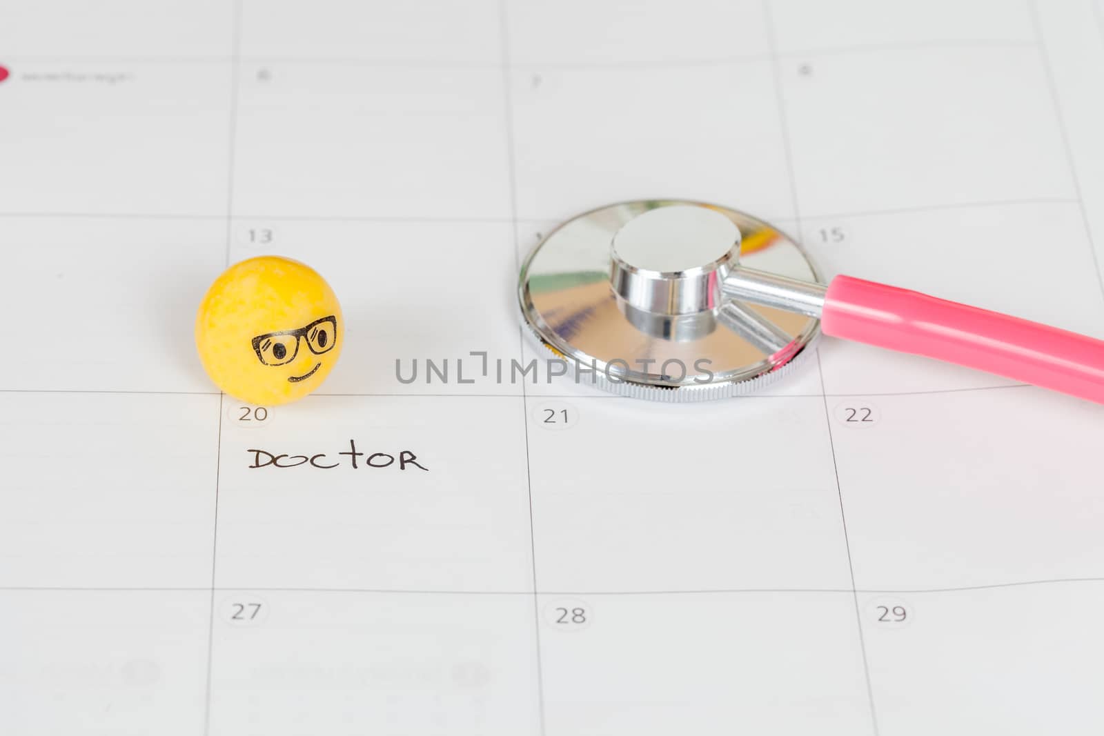 The words Doctor written on a Calendar to Remind you an Important Appointment
