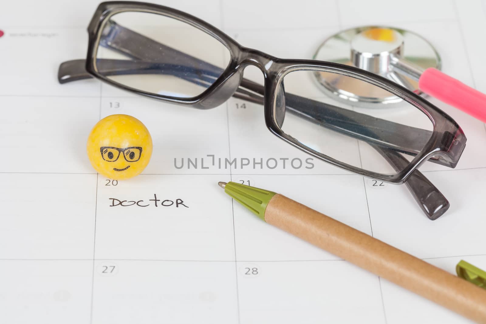 The words Doctor written on a Calendar to Remind you an Important Appointment
