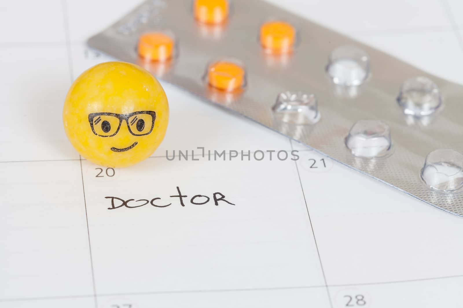 The words Doctor written on a Calendar to Remind you an Important Appointment
