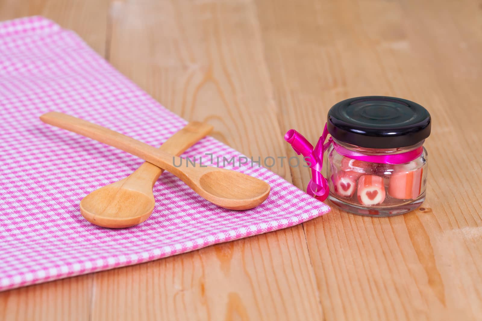 candies sweets heart in bottle on table