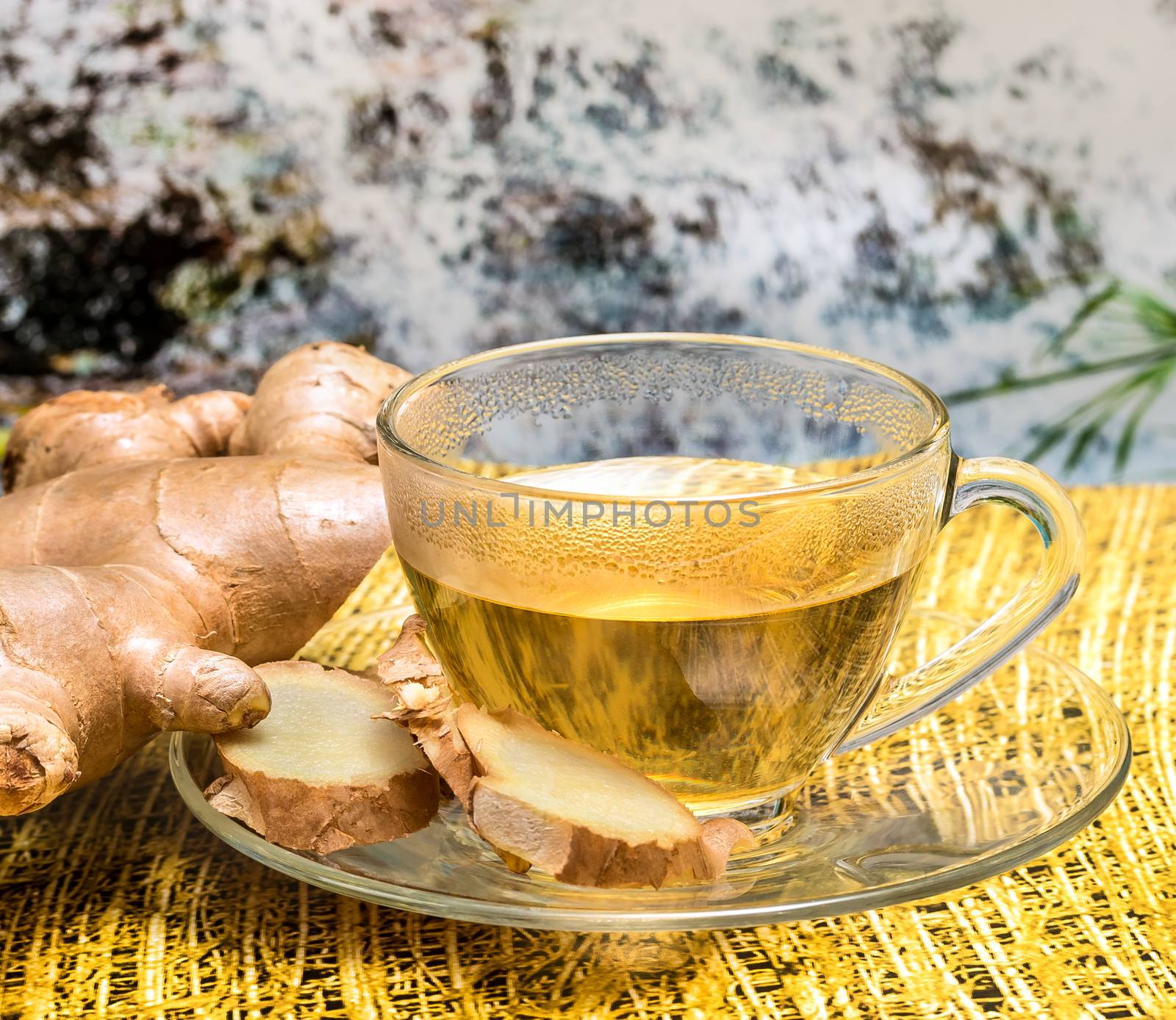 Tea Cup Showing Ginger Roots And Drink