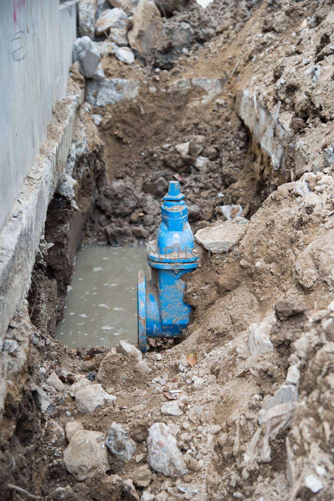 Water PVC Plastic Pipes in Ground during Plumbing Construction s by Soranop01