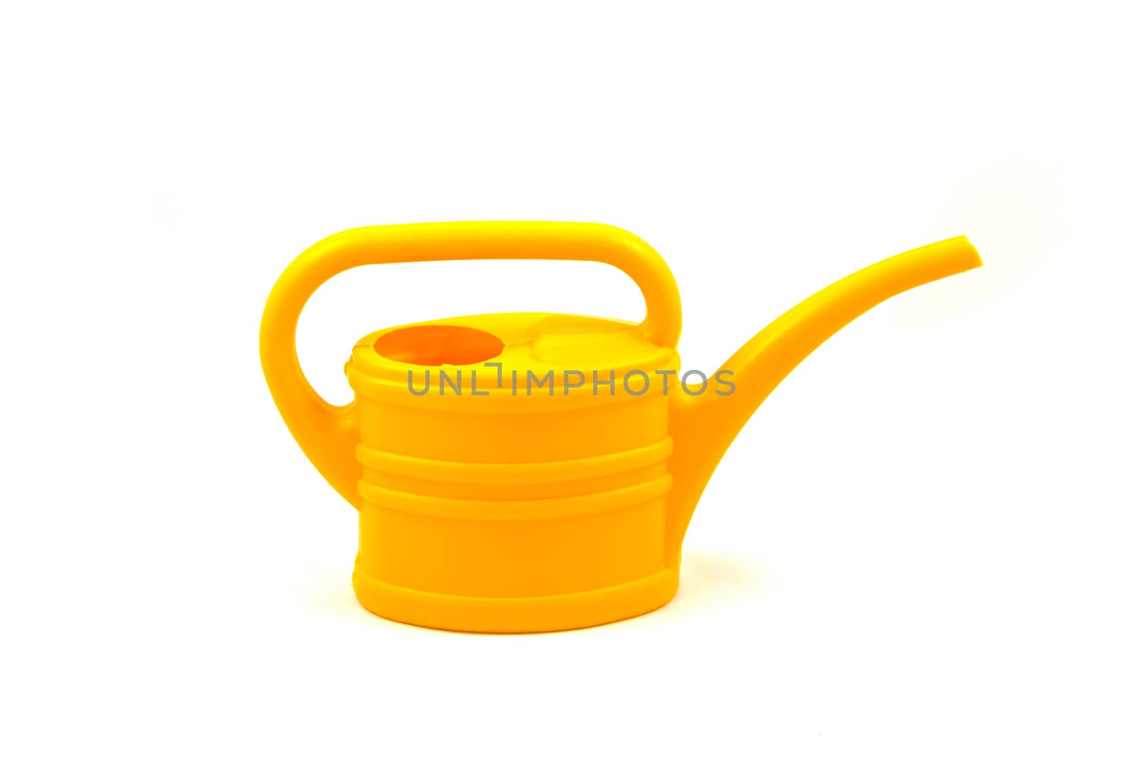 Yellow watering can isolated on a white background, closeup