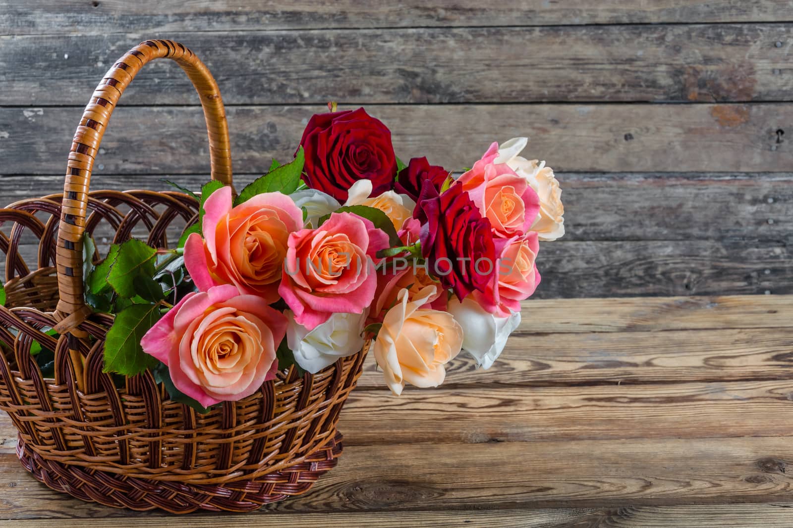 Beautiful roses in basket