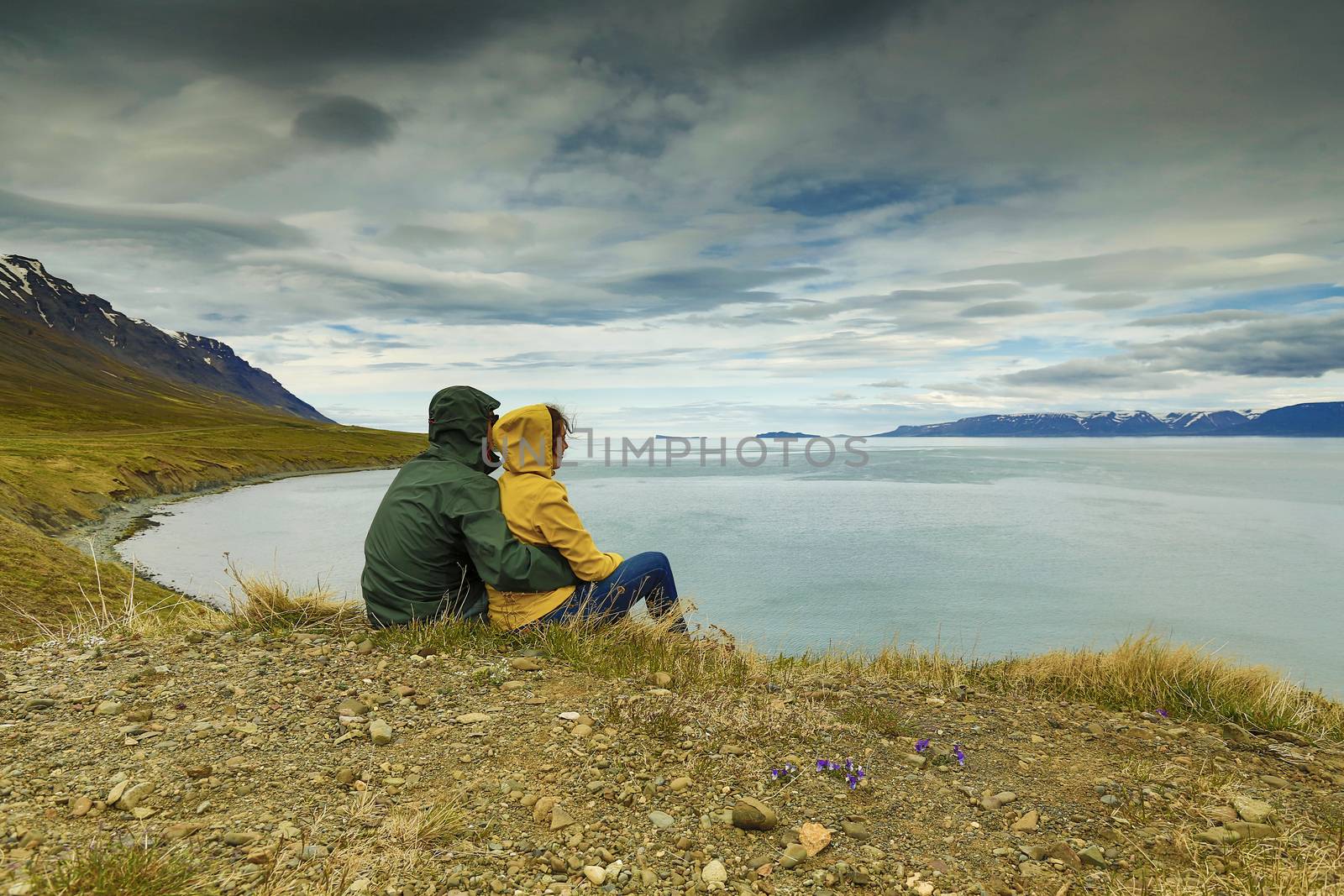 A couple contemplating the beautiful landscape