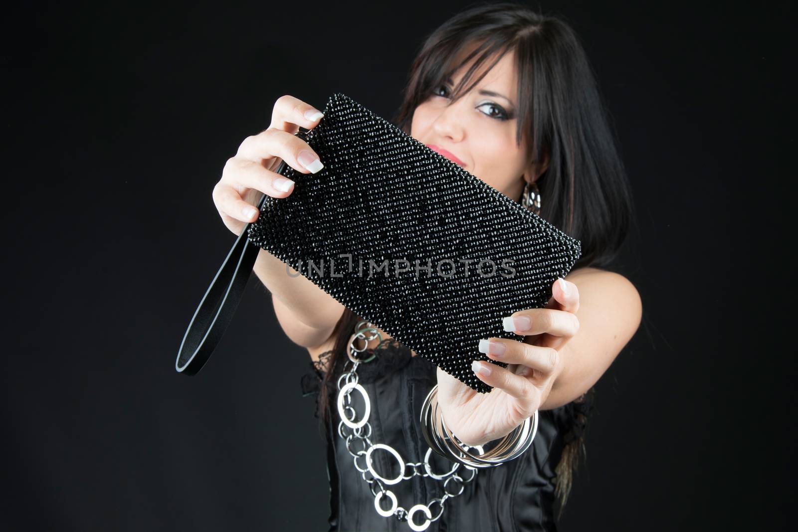 Attractive woman with her Jewelry bag. Close up