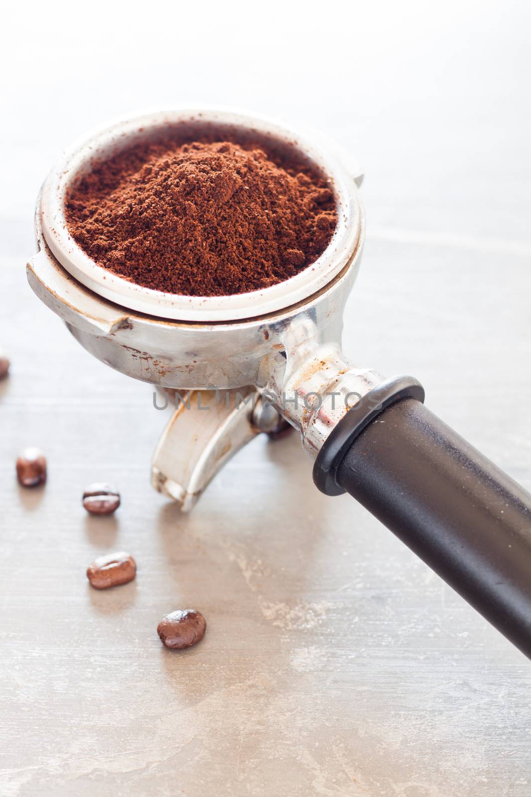 Coffee grind in group with coffee bean, stock photo