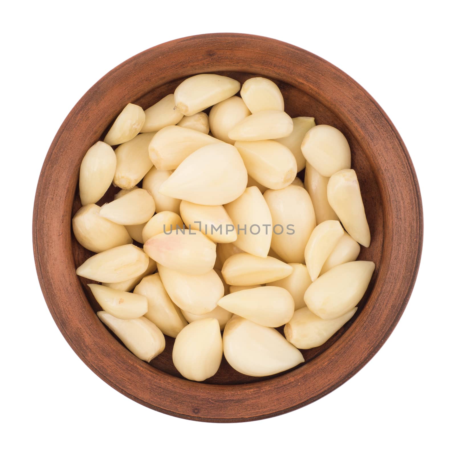 Garlic cloves in bowl from top including clipping path. Top view.