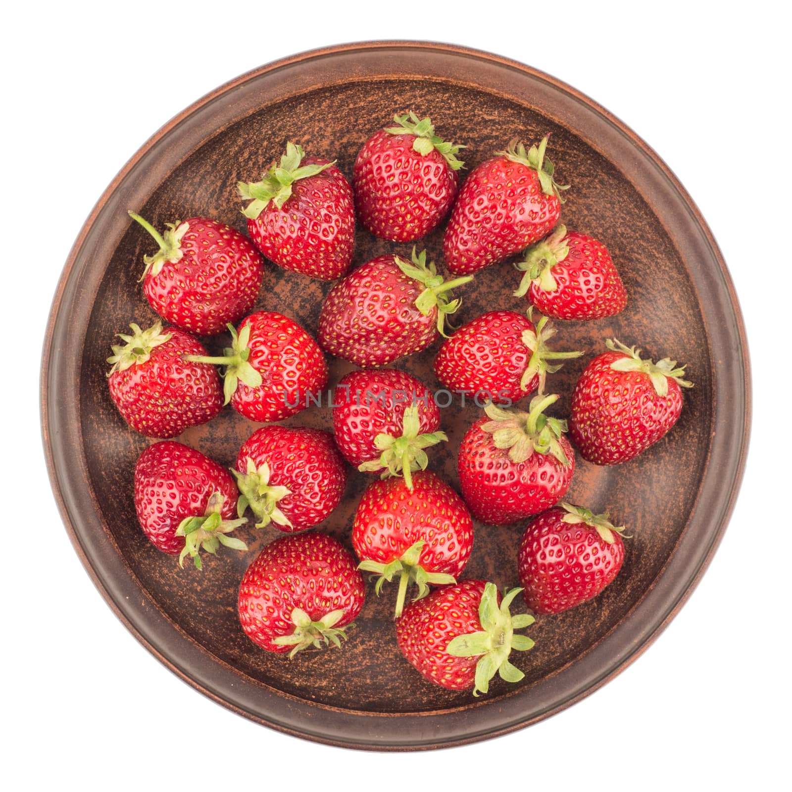 Strawberries in a ceramic plate isolated on white background. Top view.