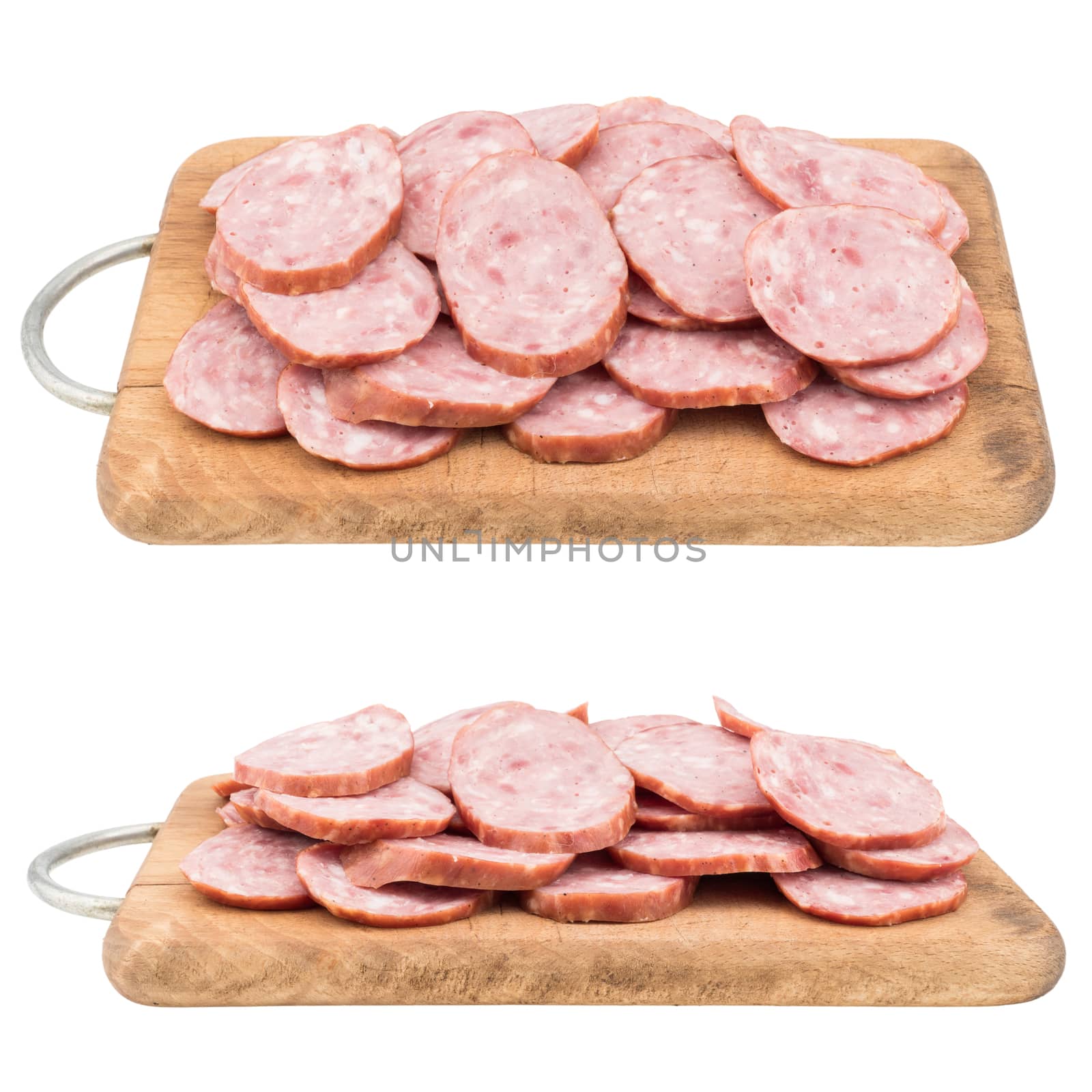 Sliced salami sausage on a cutting board. Isolated on white background. Selective focus.