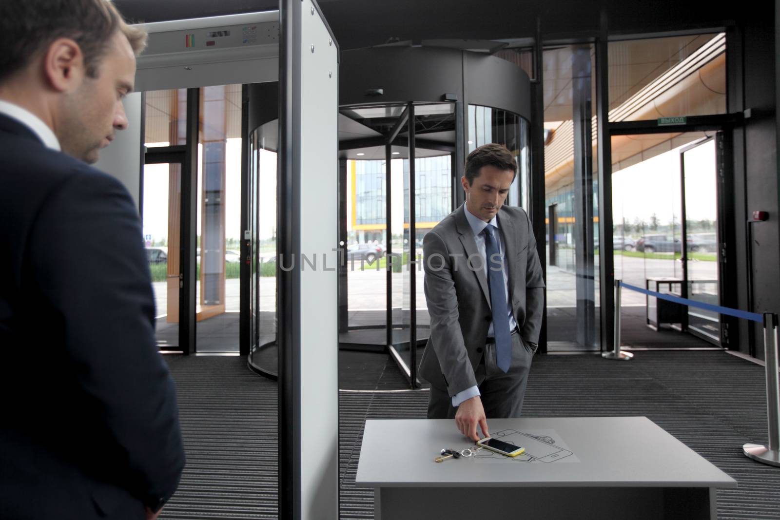 Man at security gates by ALotOfPeople