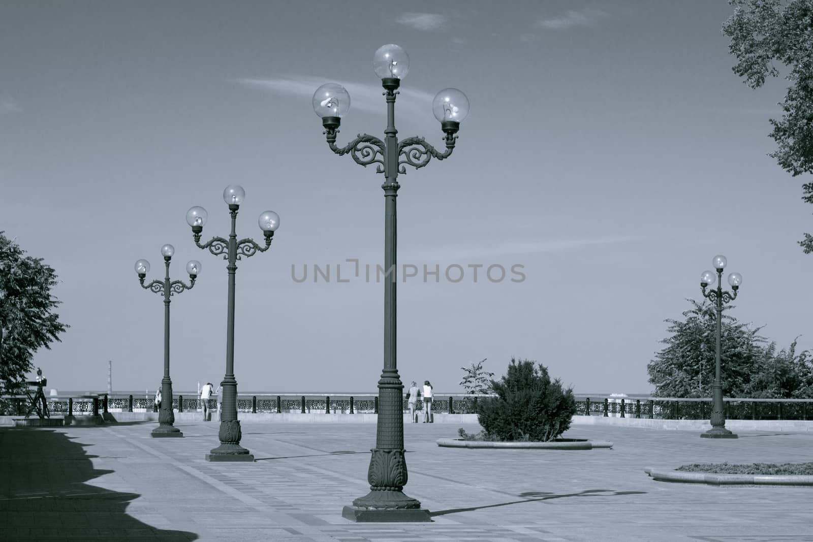 Streetlamps in city park. Walking in park by VeraVerano