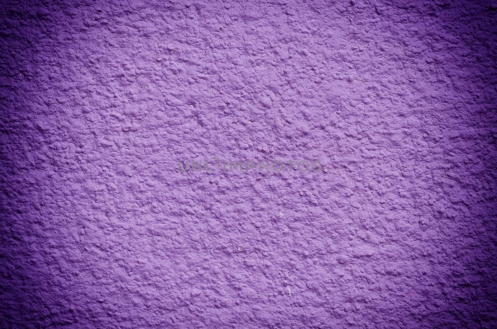violet cement wall background in vintage light