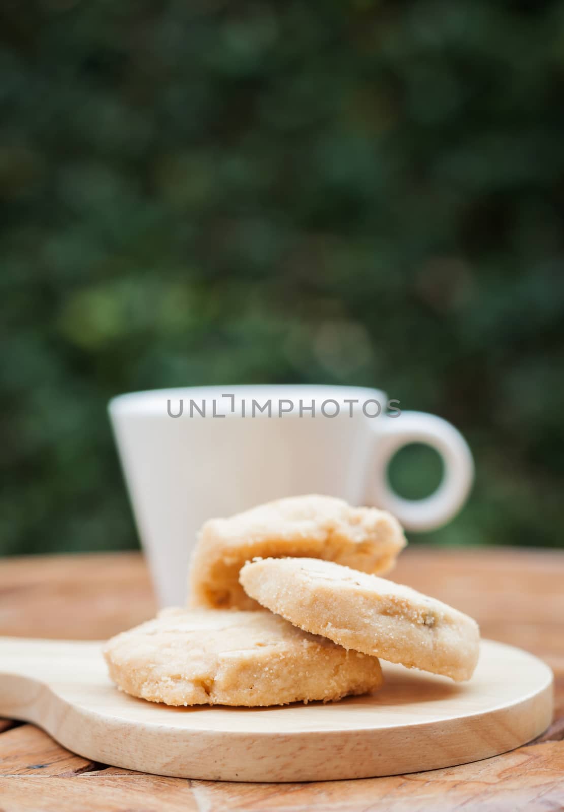 Cashew cookies with coffee cup, stock photo