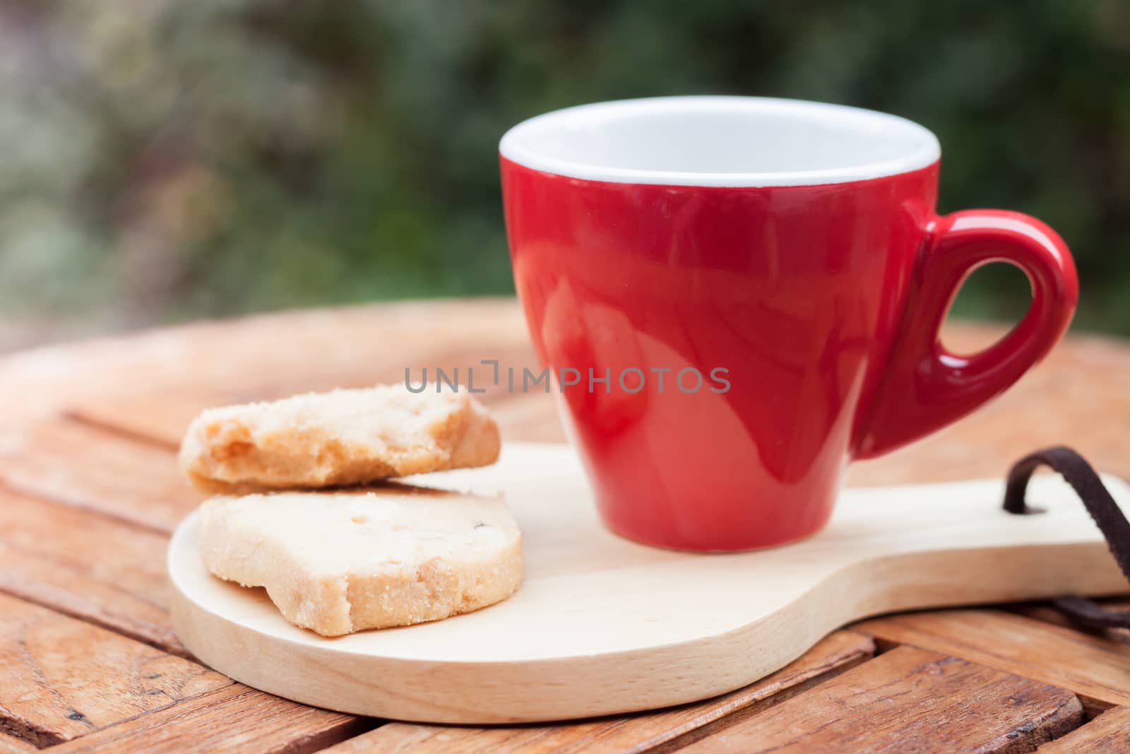 Cashew cookies with coffee cup, stock photo