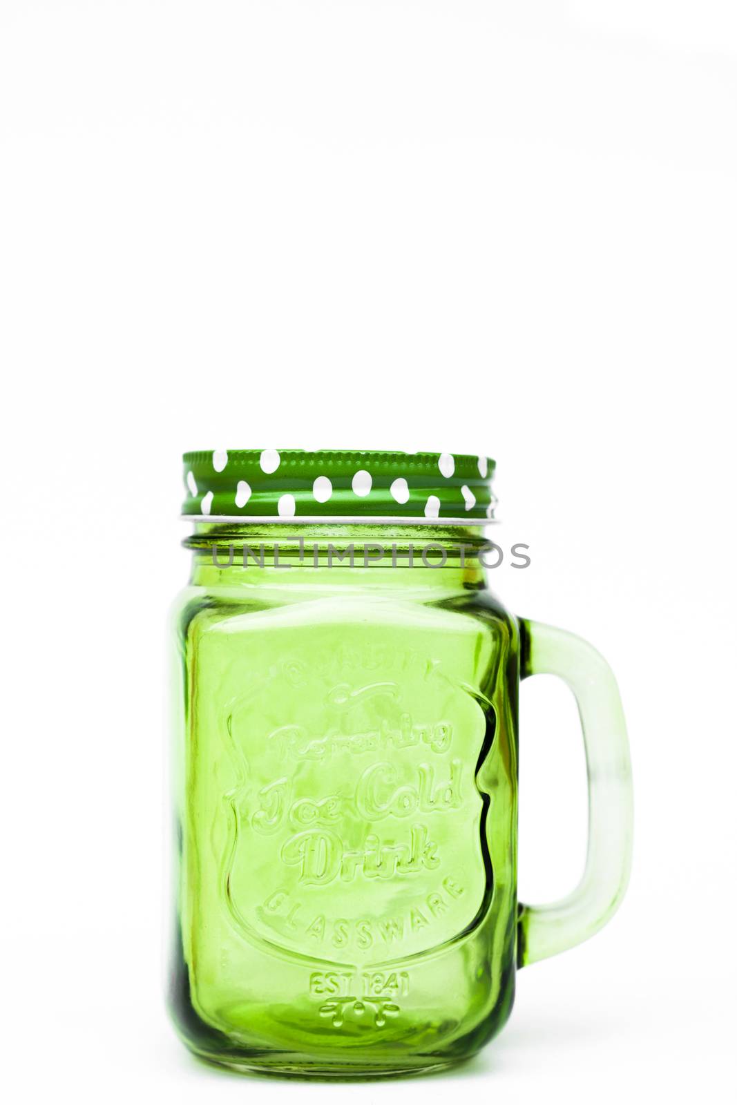 Green mason glass on white background, stock photo