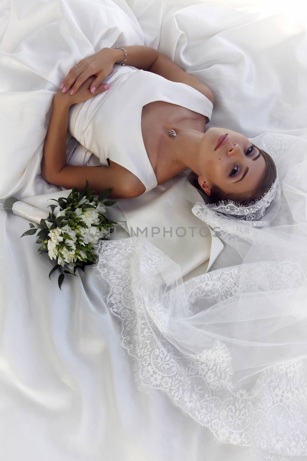 The beautiful bride with bouquet