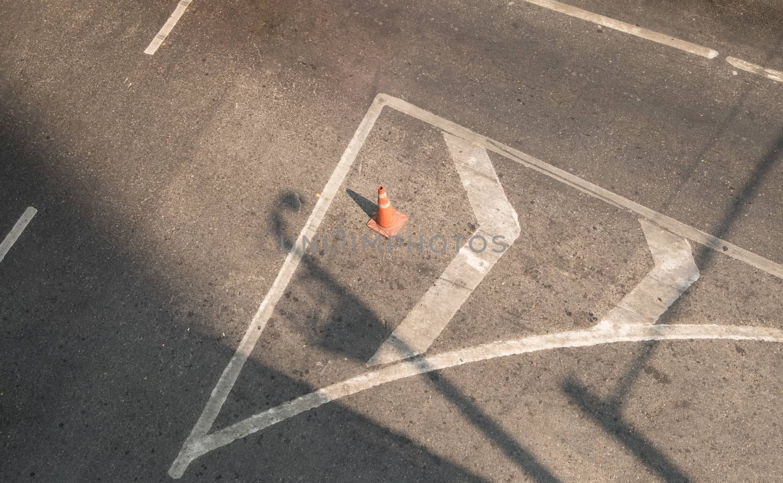 Orange funnel on the road sign drive be careful.