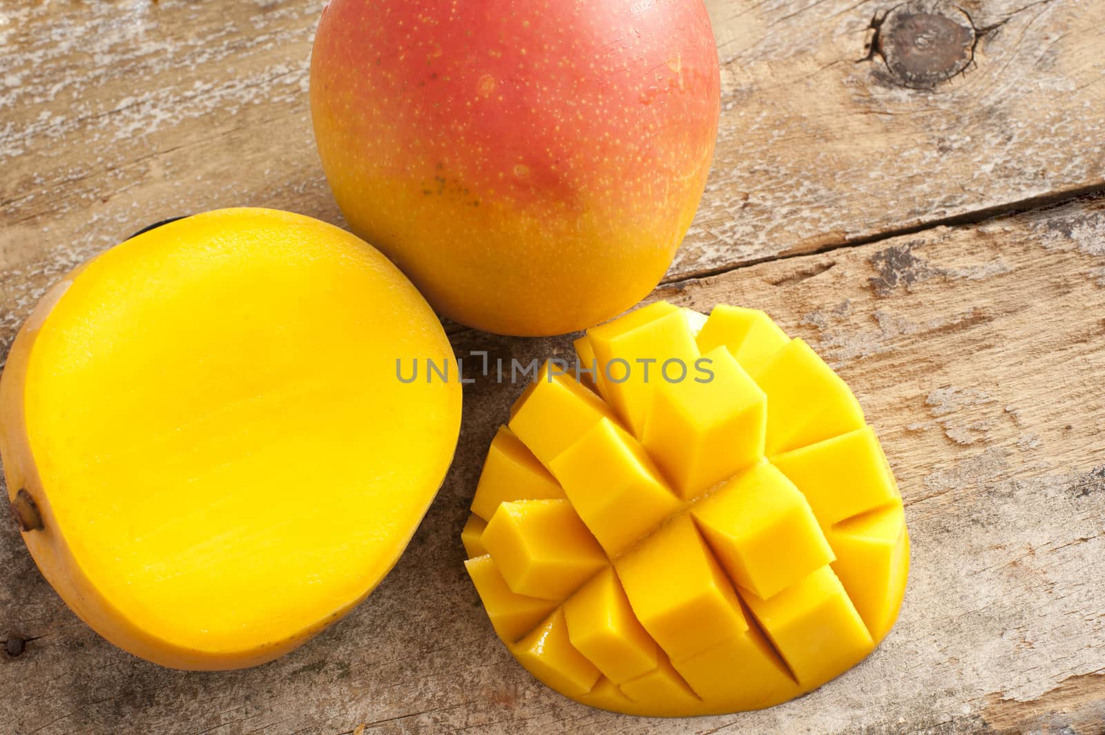Fresh ripe tropical mango whole and sliced by stockarch