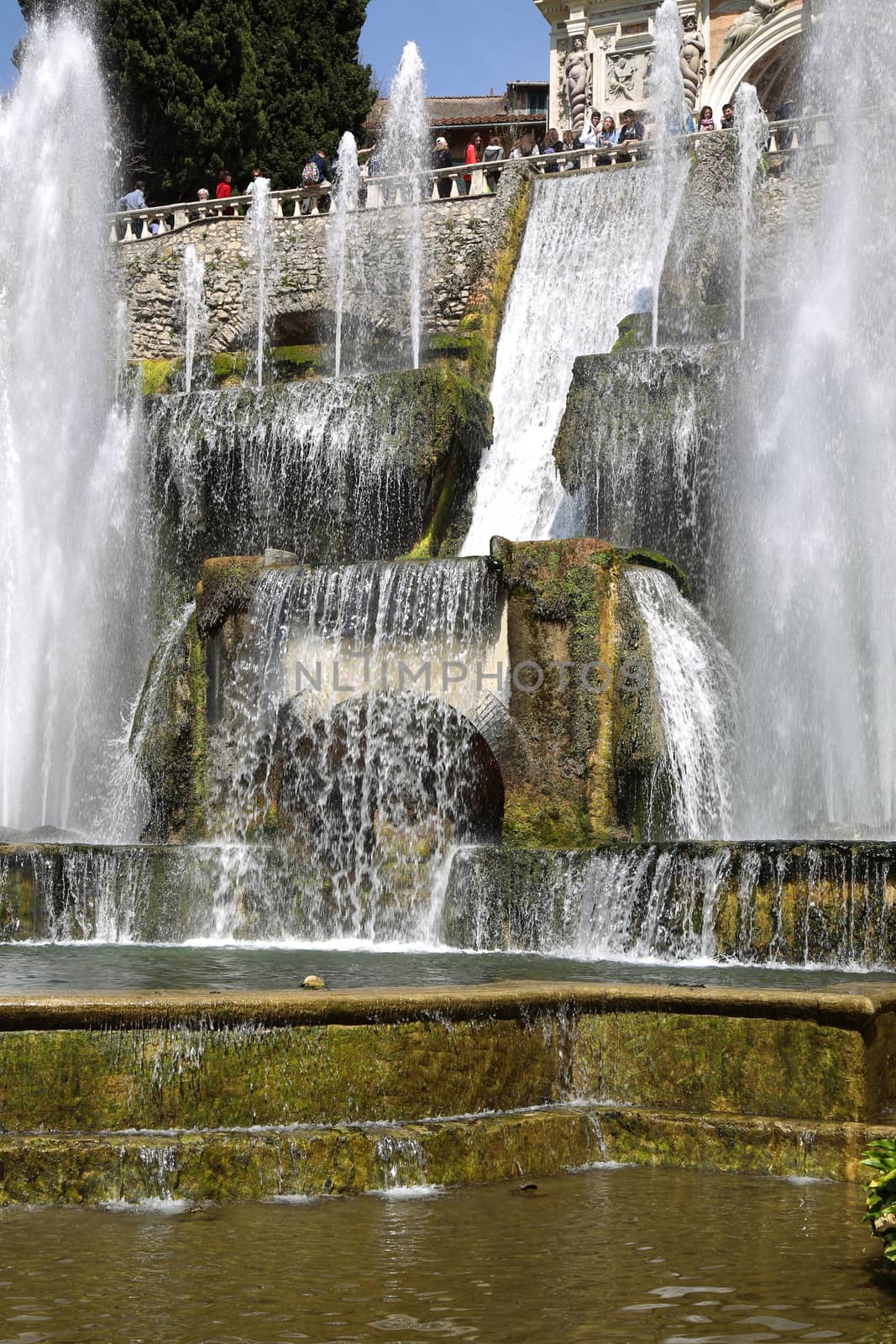 TIVOLI, ITALY - APRIL 10, 2015: Tourists visiting Fountain of Ne by vladacanon