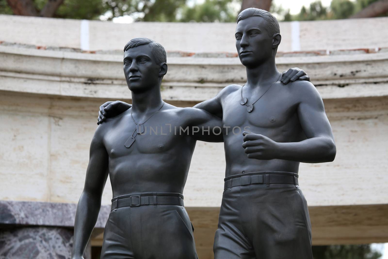 NETTUNO - April 06: Bronze statue of two brothers in arms of the American Military Cemetery of Nettuno in Italy, April 06, 2015 in Nettuno, Italy.