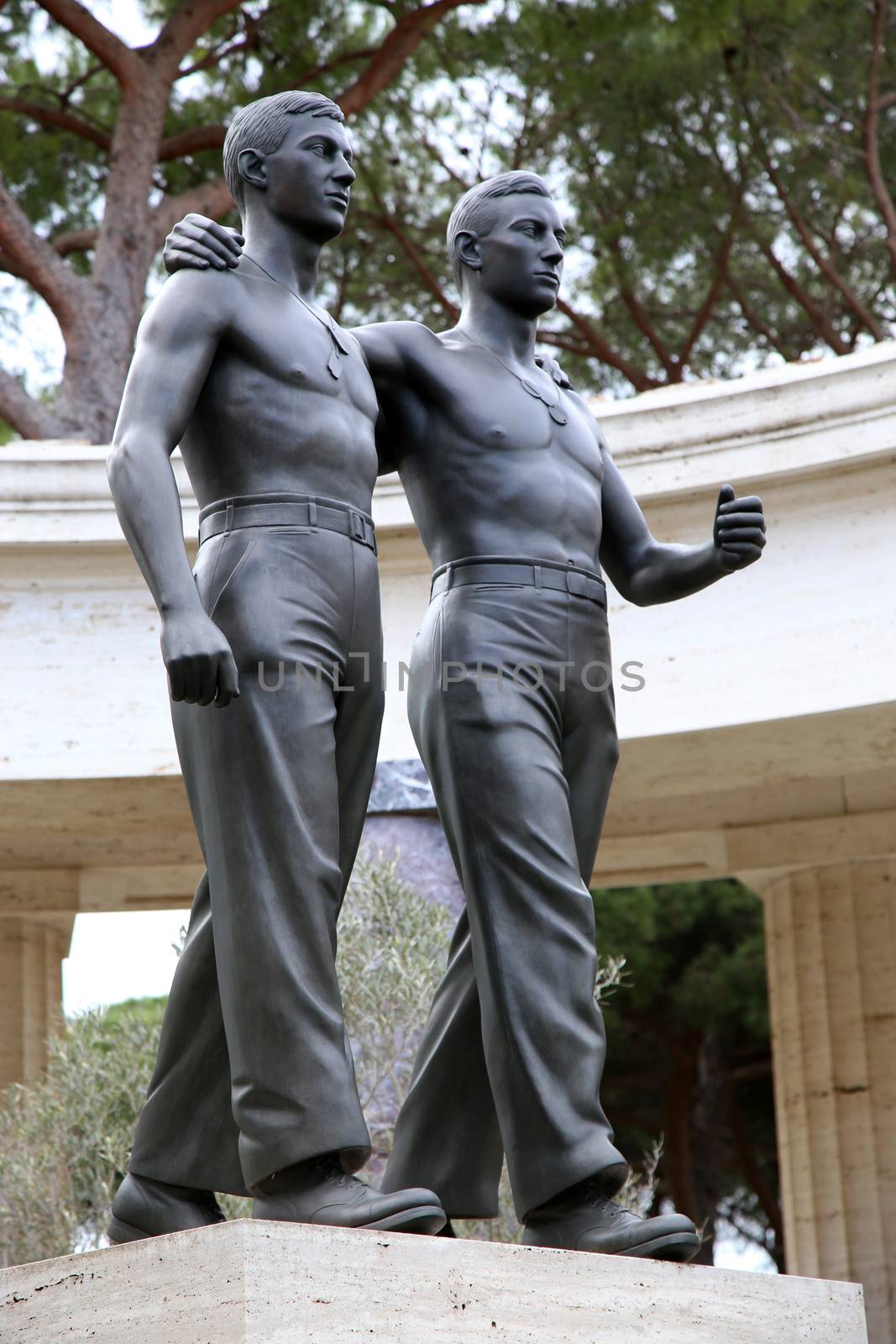 NETTUNO - April 06: Bronze statue of two brothers in arms of the American Military Cemetery of Nettuno in Italy, April 06, 2015 in Nettuno, Italy.