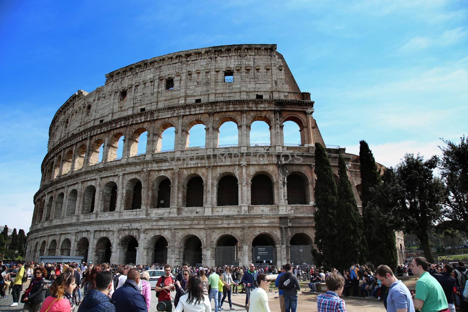 ROME, ITALY - APRIL 08: Many tourists visiting The Colosseum in Rome, Italy. Rome is the capital of Italy and region of Lazio. Italy on April 08, 2015.