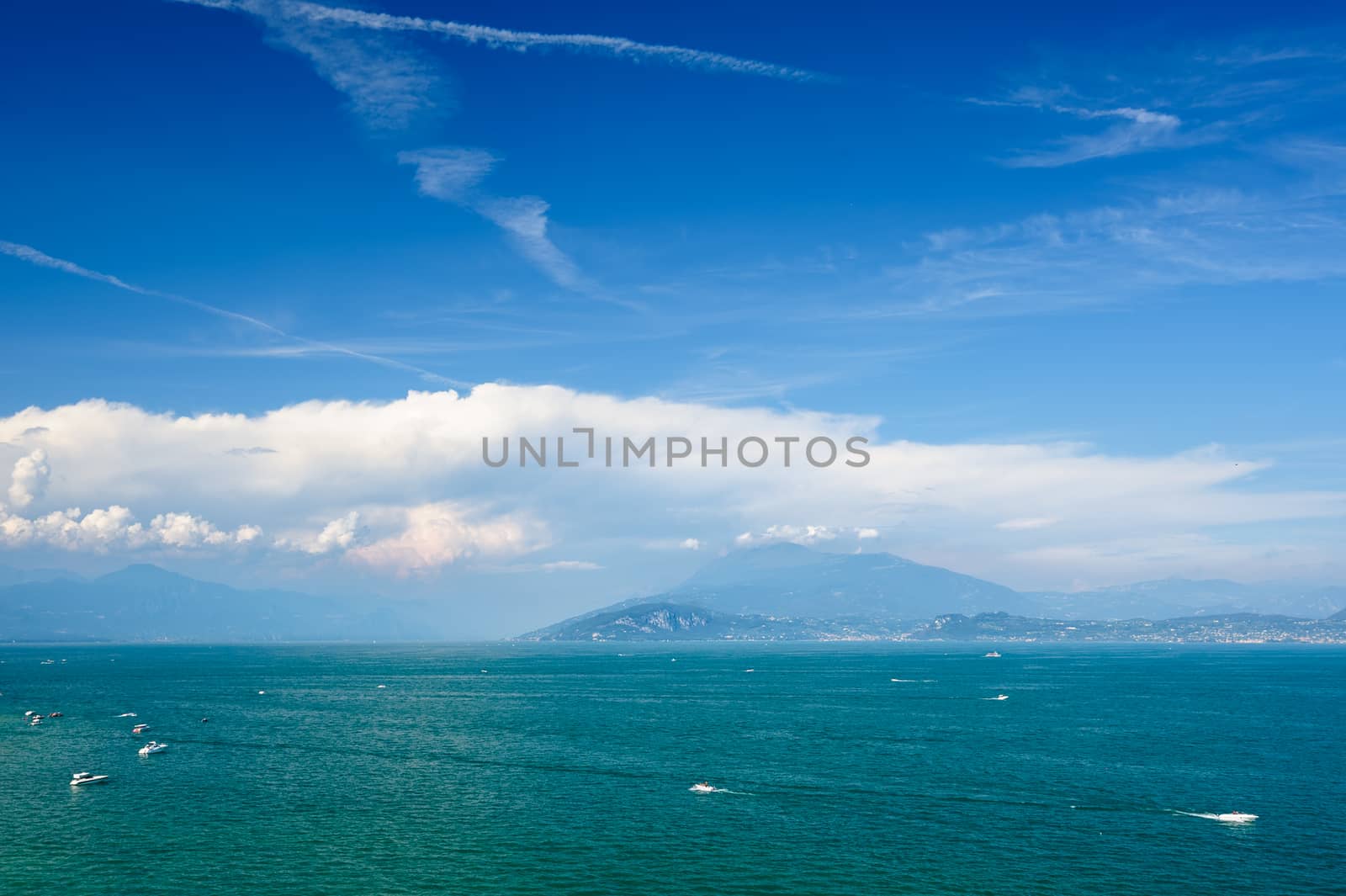 High mountains on other coast of Garda lake, Desenzano, italy